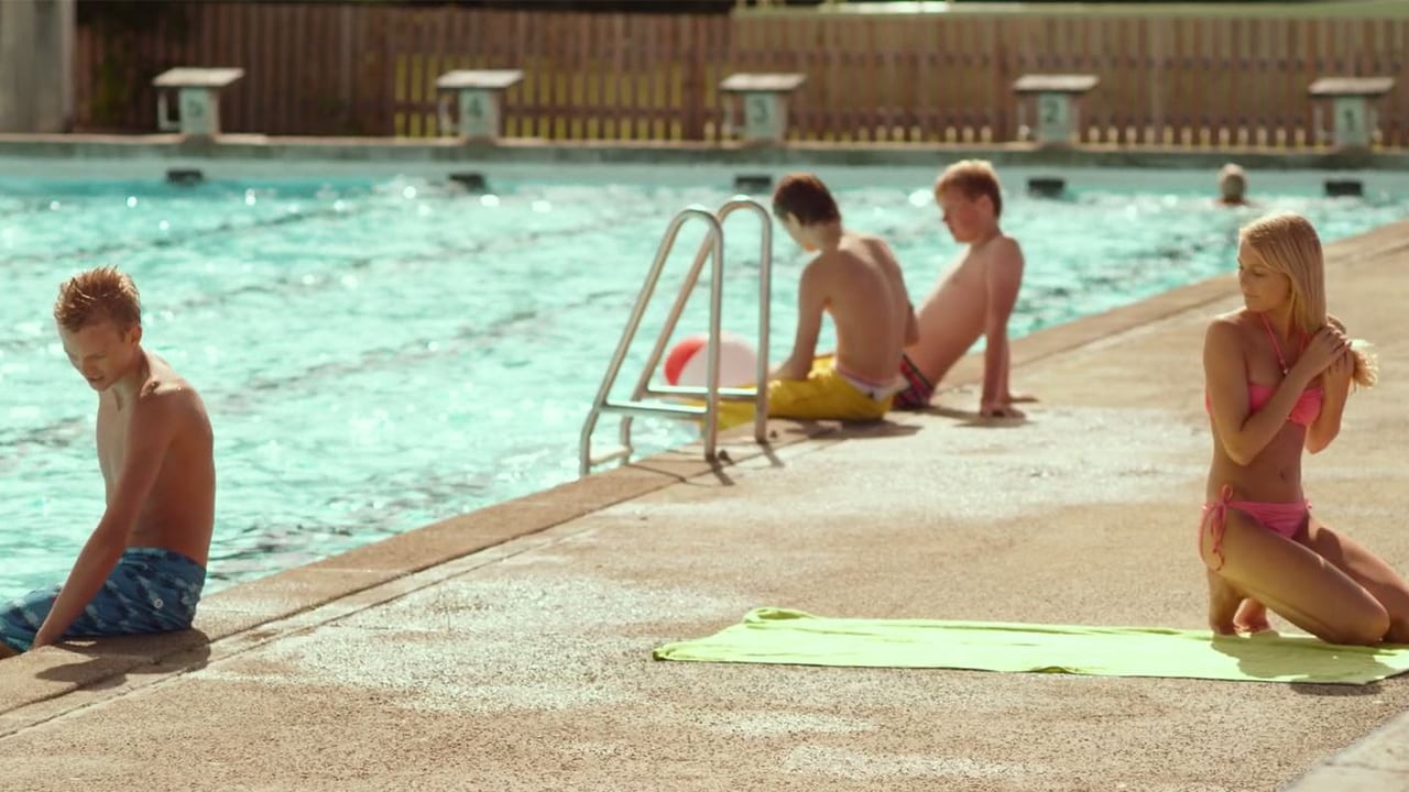 Teen couple having public pool