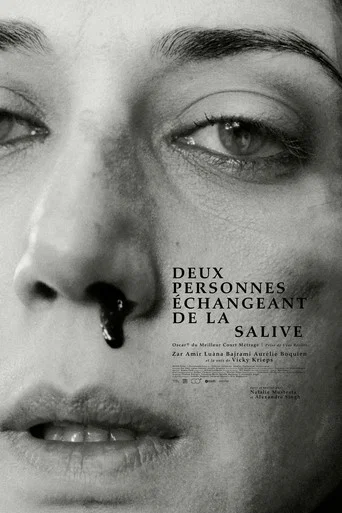 Two People Exchanging Saliva