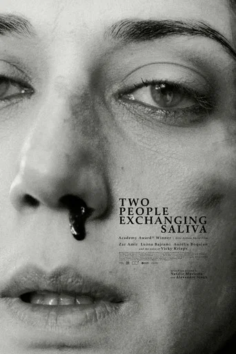 Two People Exchanging Saliva