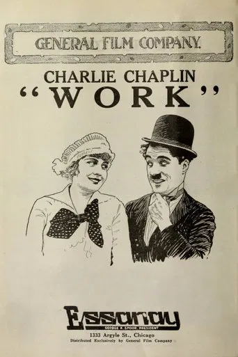 Charlot, trabajando de papelista